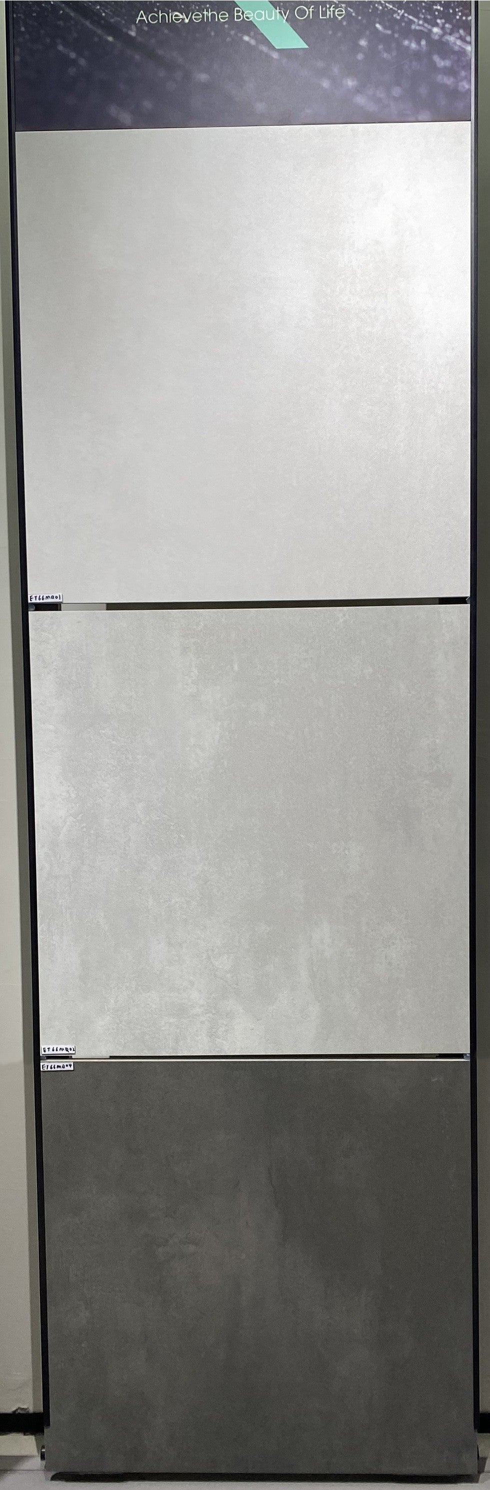 Cement White, Grey and Dark Grey porcelain tiles stacked